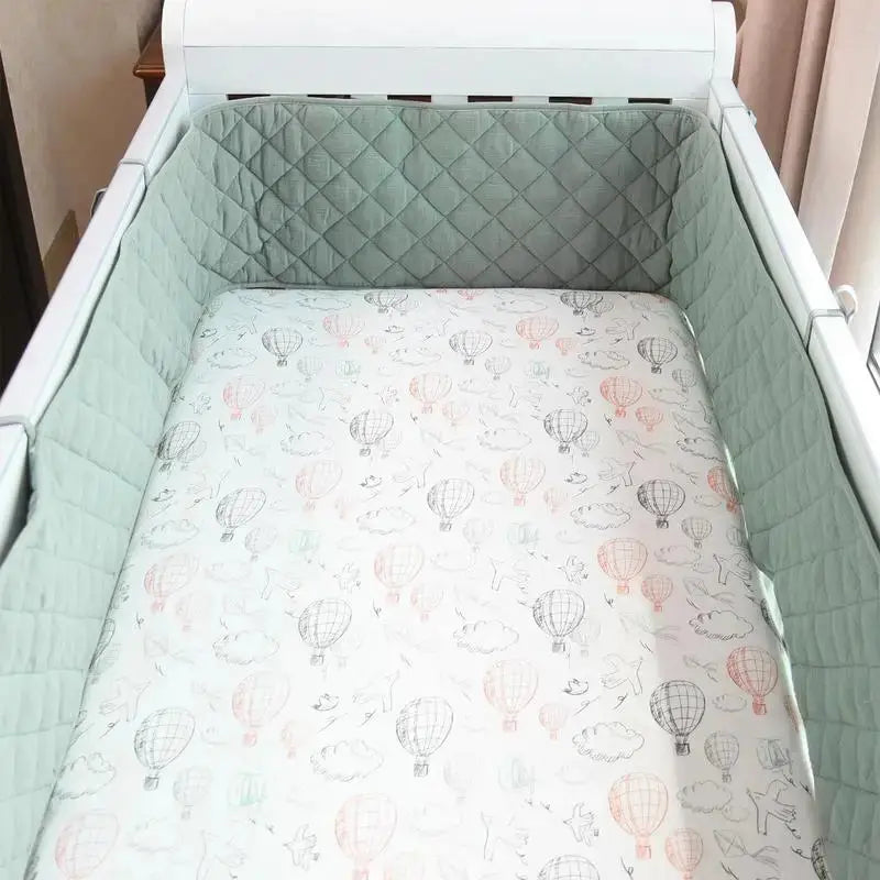 Contour de lit de bébé - Monde à maman