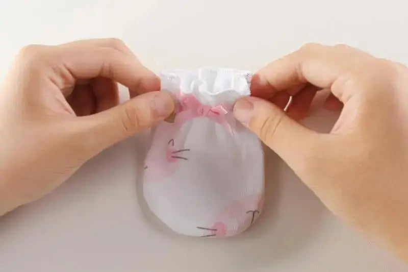 Mitaines pour nouveau - né - Monde à maman