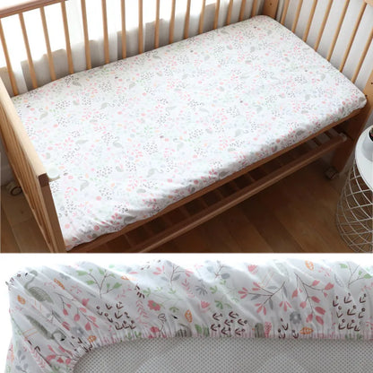 Drap-contour-lit-bebe-fleurs-monde-a-maman