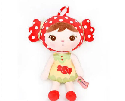 Poupée de chiffon Les Amies de Monde à Maman avec vêtements colorés et visage souriant, idéale pour les enfants.