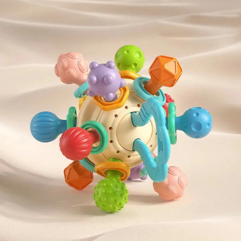 Hochet bébé - Monde à maman