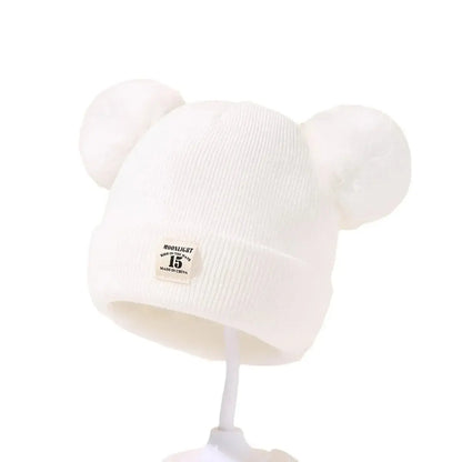 Tuque-pour-bébé-blanche-monde-a-maman
