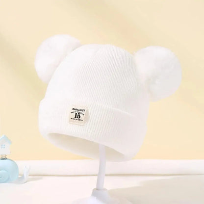 Tuque-a-pompons-bébé-monde-a-maman