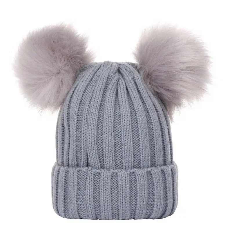 Tuque-a-a pompom-grise