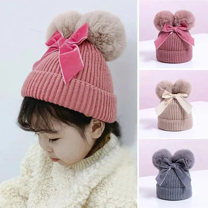 Bonnet à pompons avec boucle - Monde à maman