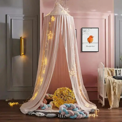 Tente-de-lit-bébé-rose-pale-monde-a-maman