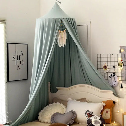 Tente-de-lit-bébé-vert-monde-a-maman